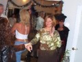 Kathi, dances while in the background, Lady Zorro plans her next move