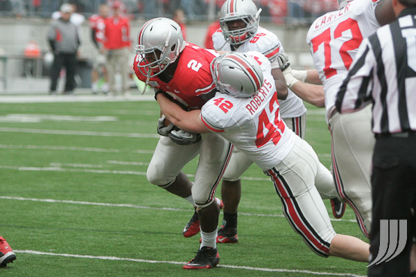 Luke Roberts making a tackle in a Spring Game.